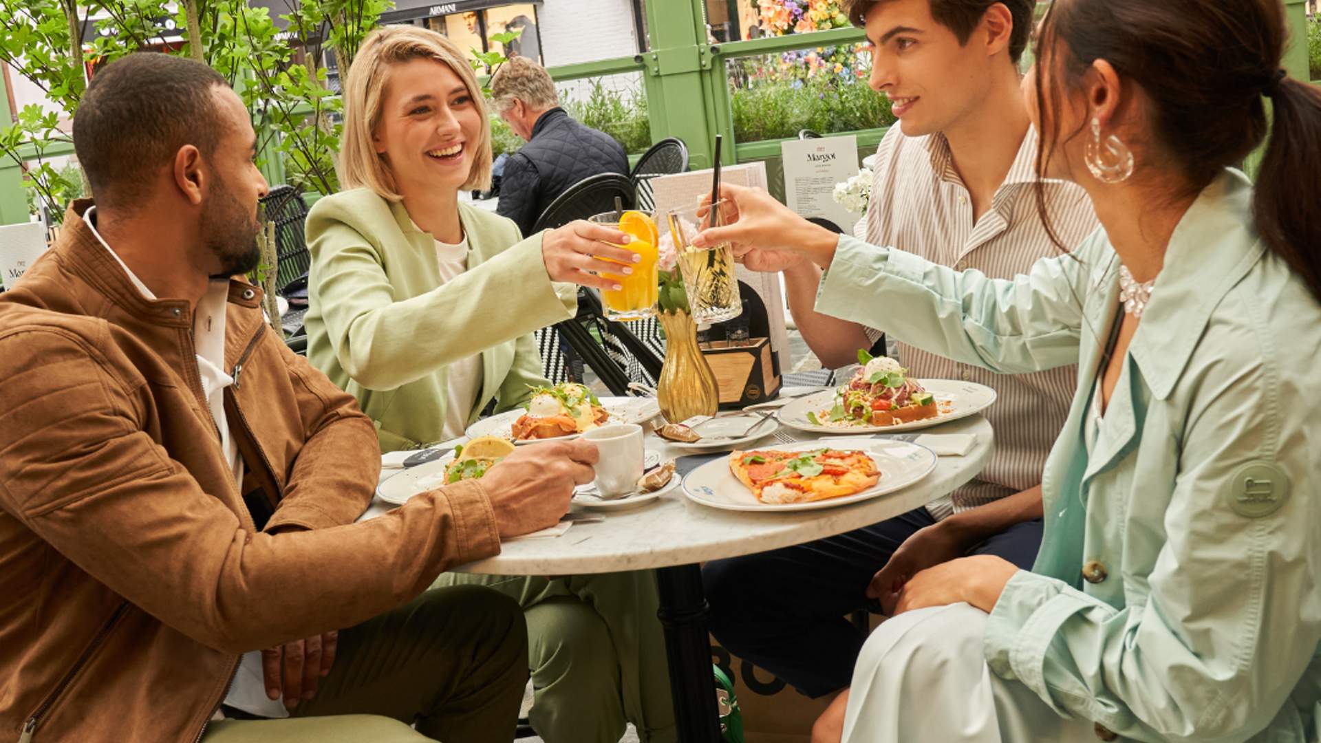 Group of friends enjoying lunch at Chez Margot