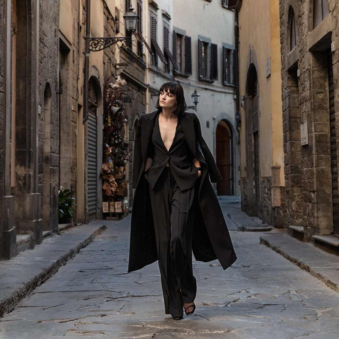 Sandro Ferrone brand image, a woman with black suit