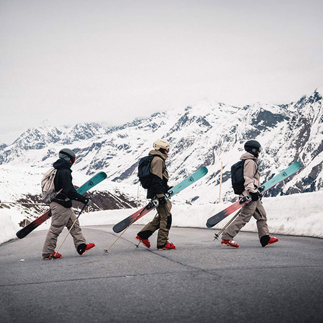 Rossignol 3 men wearing ski suits