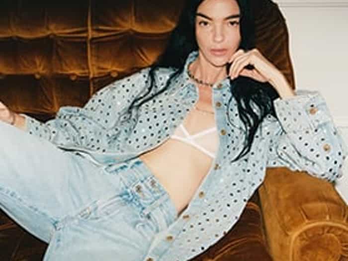 Lady on couch wearing denim
