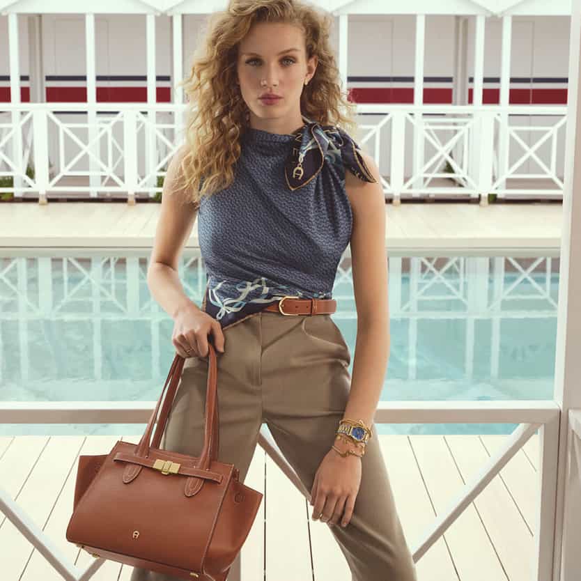 Girl with a brown leather bag