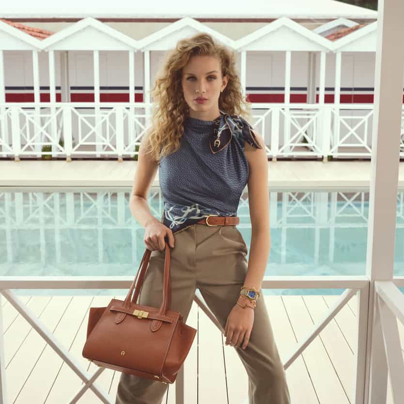 Girl with a brown leather bag