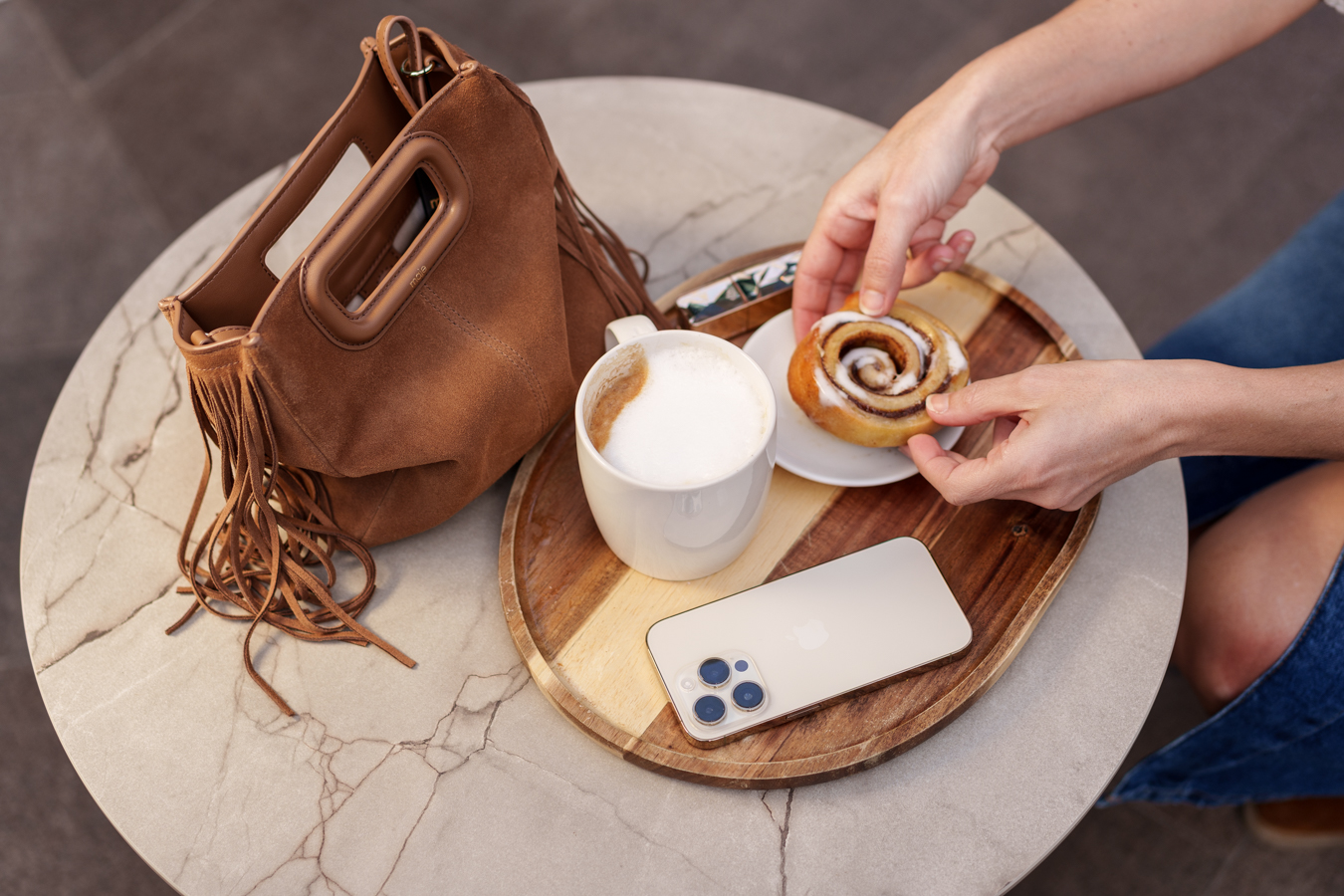 Cup of coffee and handbag